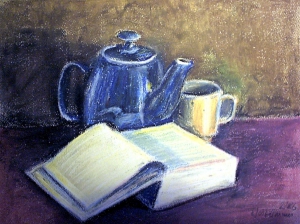 Buch und Teekanne